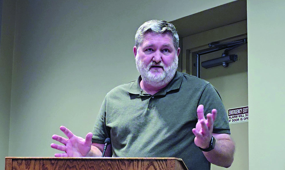 Mike Dickover speaks at the Aug. 26, 2025, Homewood board meeting to request the village increase fines for people cited for violating animal ordinances. (Eric Crump/H-F Chronicle)