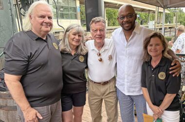From left, Flossmoor Trustee Jim Mitros, Flossmoor Station co-owners Carolyn Armstrong and Dean Armstrong, state Rep. Will Davis and Flossmoor Mayor Michelle Nelson. (Nick Ulanowski / H-F Chronicle)