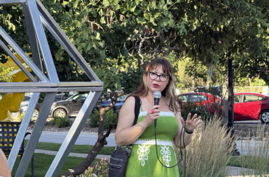 Flossmoor Art Commissioner Jodie Lawrence discusses "Centennial." “This piece was made by high school students. How special is that?" she said. (Stephanie Sokol/H-F Chronicle)
