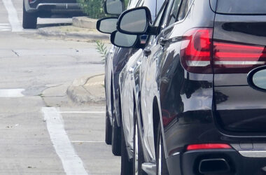 Bike lanes adjacent to parking spaces are sometimes called "door zones" by cyclists who fear being struck by car doors being opened into the bike lane. The Dutch Reach is a way drivers can improve safety. (Eric Crump/H-F Chronicle)